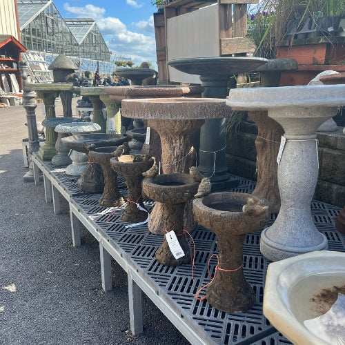 Wild bird baths inside of Heinz Brothers store