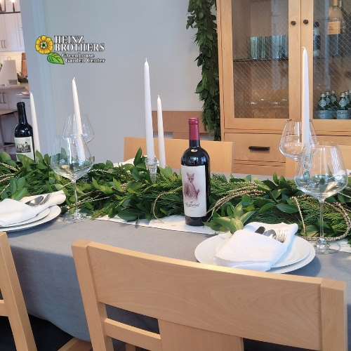 Holiday plants on a dinner table