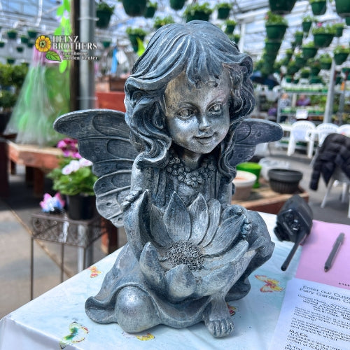 An angel statue inside of the garden center at Heinz Brothers