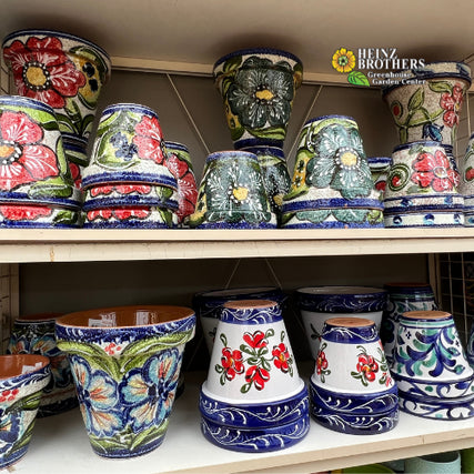 Pots & Potterycolorful painted pottery on a shelf
