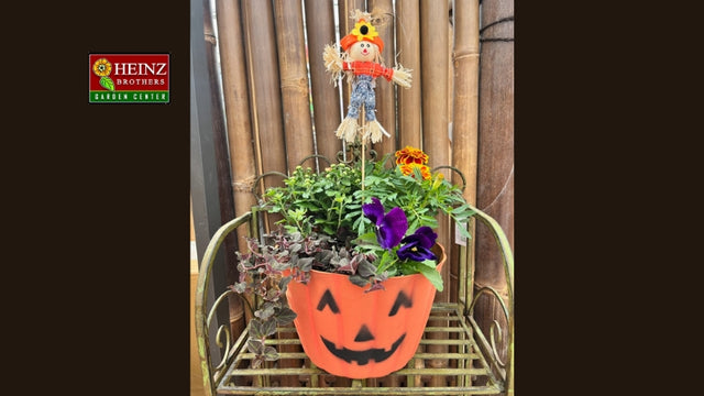 Pumpkin head fall planter