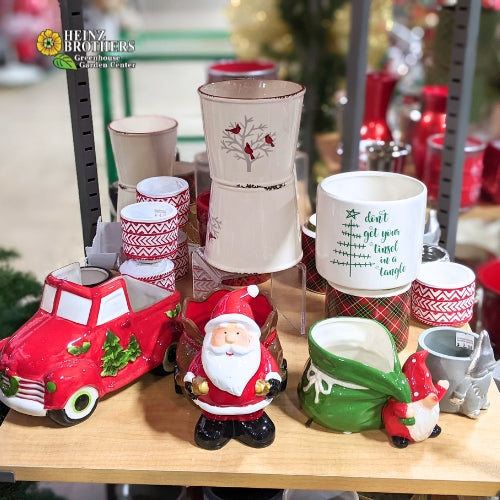  collection of glazed ceramic cache pots with holiday themes