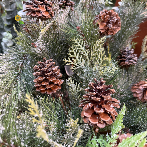 Artificial Christmas garland with pine cones and sparkle ice/snow accents